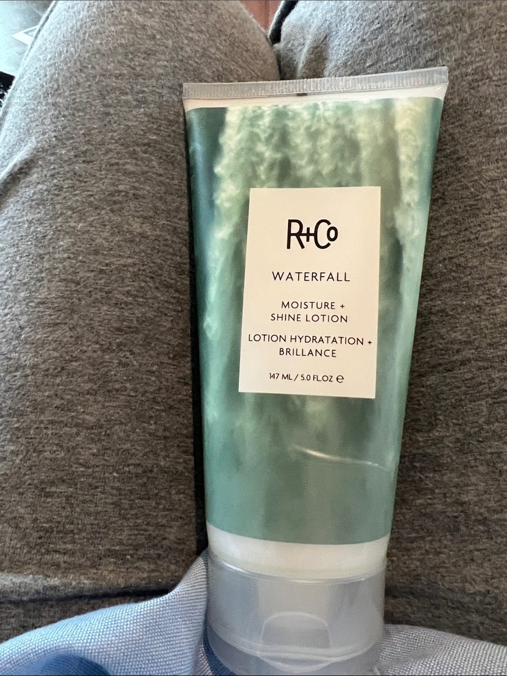 R+Co Waterfall Moisture + Shine Lotion — seafoam green for hair